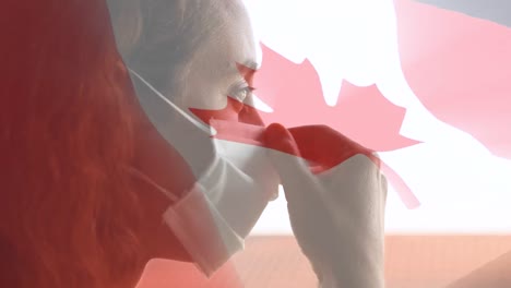 Animation-Der-Flagge-Kanadas,-Die-über-Einer-Frau-Mit-Gesichtsmasken-Weht