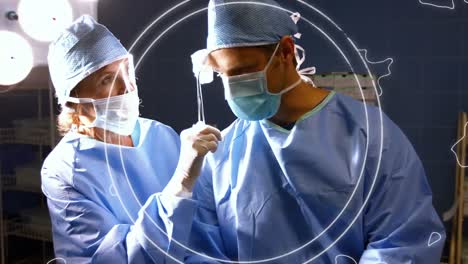 Animation-of-moving-lines-over-surgeons-in-face-masks