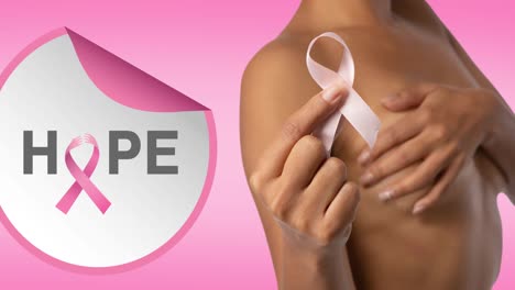 Animation-of-pink-ribbon-logo-with-hope-text-over-woman-covering-the-breast