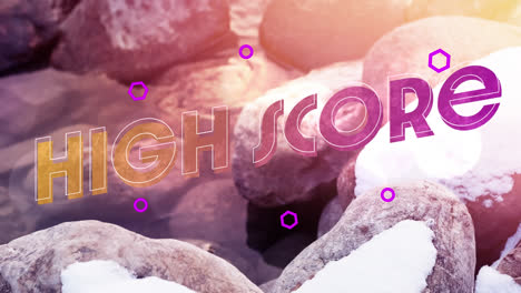 Animation-of-high-score-text-over-stones-cover-with-snow