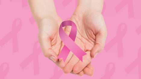 Animation-Des-Pink-Ribbon-Logos-über-Händen-Auf-Rosa-Hintergrund