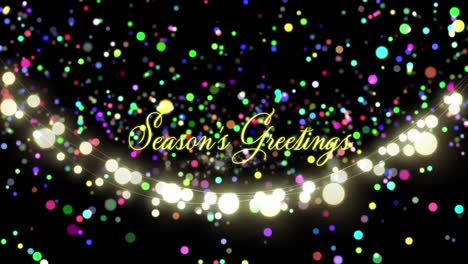 Animation-of-seasons-greetings-text-over-light-spots