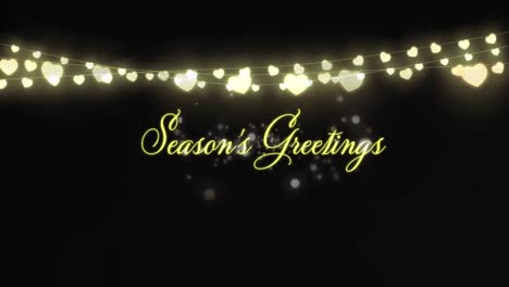 Animation-of-season's-greetings-text-and-christmas-fairy-lights-decoration-on-black-background