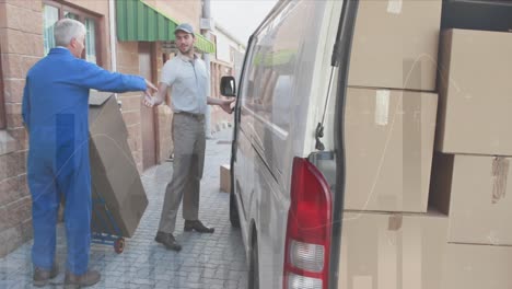 Animation-of-data-processing-over-man-packing-boxes-into-car