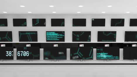 Animation-of-digital-data-processing-across-multiple-flat-screen-tvs-in-shop-display