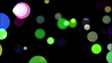 Animation-of-colourful-bokeh-circles-of-light-floating-across-black-background