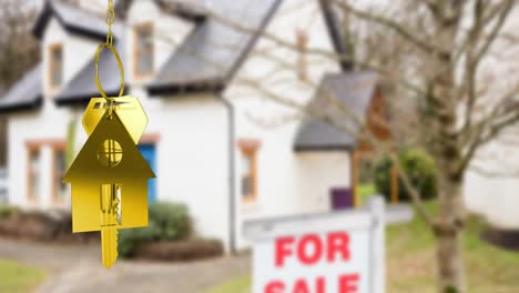 Animation-of-gold-house-key-fob-and-key,-hanging-in-front-of-blurred-house-with-for-sale-sign