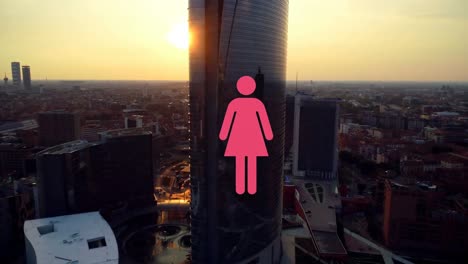 Animation-of-single-red-woman-icon-appearing-over-modern-cityscape-at-sunset