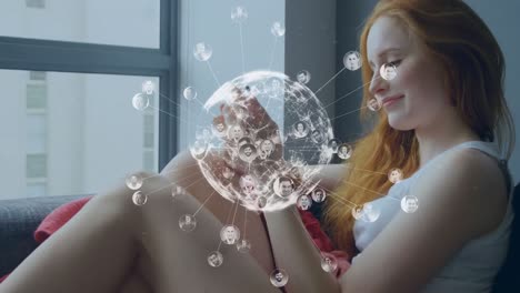 Animation-of-digital-globe-of-connections-over-woman-using-smartphone
