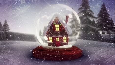Animation-Von-Fallendem-Schnee-Und-Glasschneeball-über-Der-Winterlandschaft