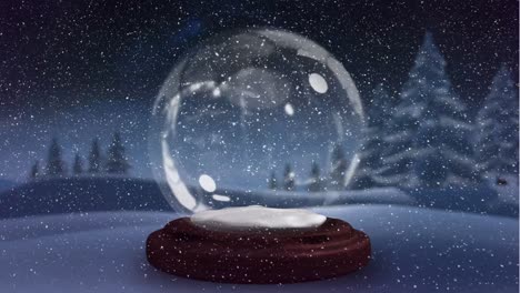 Animation-of-snow-falling-and-glass-snow-ball-over-winter-landscape