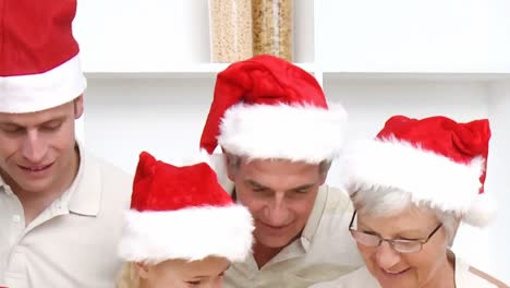 Montage-of-cute-families-celebrating-christmas-
