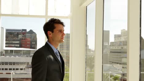 Businessman-looking-out-his-window