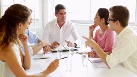 Team-of-business-people-having-a-meeting