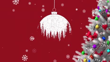 Hanging-bauble-decoration-and-snow-falling-over-christmas-tree-against-red-background