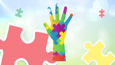 Animation-of-colourful-puzzle-pieces-forming-hand-over-sky