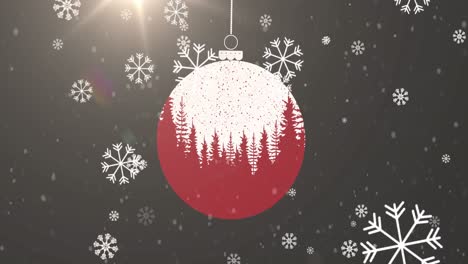 Animation-of-snowflakes-falling-over-christmas-bauble-decoration