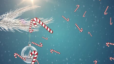 Candy-cane-icons-falling-over-christmas-tree-in-a-bauble-hanging-over-a-branch-on-blue-background