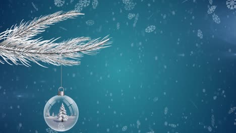 Snowflakes-falling-over-christmas-tree-in-a-bauble-hanging-over-a-branch-against-blue-background