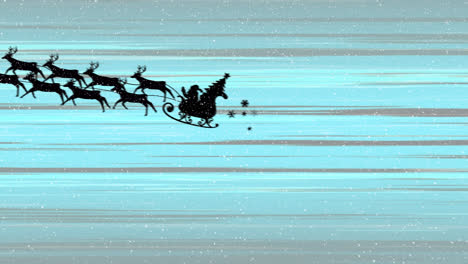 Snow-falling-on-santa-claus-in-sleigh-being-pulled-by-reindeers-and-light-trails-on-blue-background
