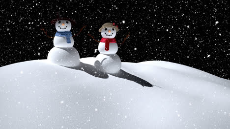 Snow-falling-over-snowman-and-snowwoman-on-winter-landscape-against-black-background