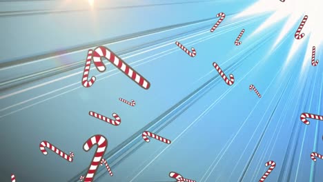 Digital-animation-of-multiple-candy-cane-icons-falling-against-light-trails-on-blue-background