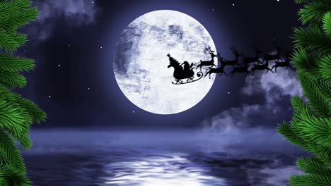 Green-tree-branches-over-santa-claus-in-sleigh-being-pulled-by-reindeers-against-moon-in-night-sky