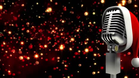Santa-hat-over-microphone-against-red-spots-of-light-against-black-background