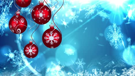 Animation-Von-Weihnachtskugeln-Und-Schnee,-Der-Auf-Blauen-Hintergrund-Mit-Bokeh-Fällt