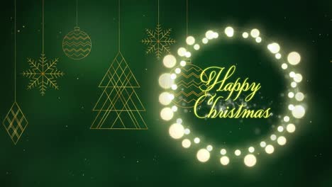 Texto-De-Feliz-Navidad-Y-Luces-De-Hadas-Contra-Adornos-Navideños-Colgantes-Sobre-Fondo-Verde