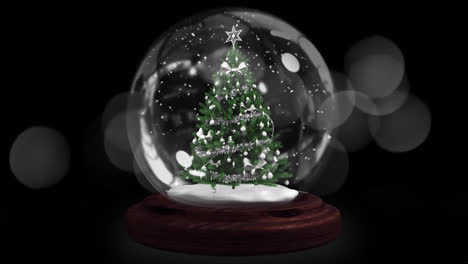 Animation-of-falling-stars-and-snow-globe-with-christmas-tree-over-fireworks-on-dark-background