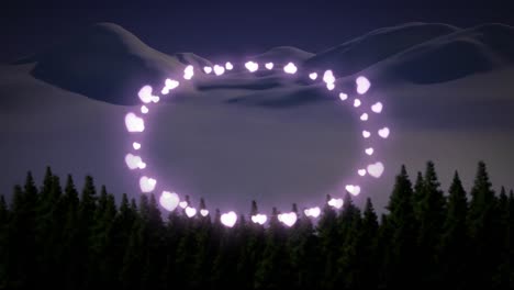 Pink-heart-shaped-fairy-lights-against-winter-landscape-with-multiple-trees