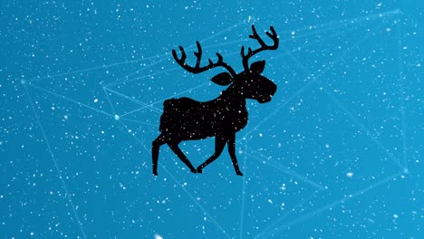 Snow-falling-over-silhouette-of-reindeer-walking-against-network-of-connections-on-blue-background