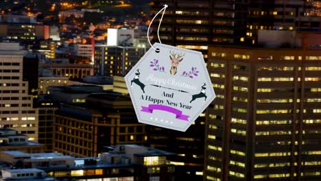 Hexagonal-shaped-happy-christmas-and-new-year-text-banner-against-aerial-view-of-night-cityscape