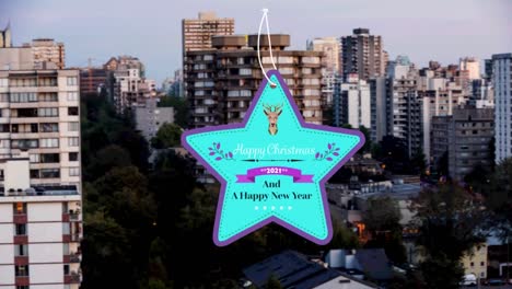 Star-shaped-happy-christmas-and-new-year-text-banner-against-aerial-view-of-cityscape