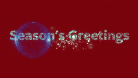 Season's-greetings-text-and-hanging-blue-bauble-against-fireworks-exploding-on-red-background
