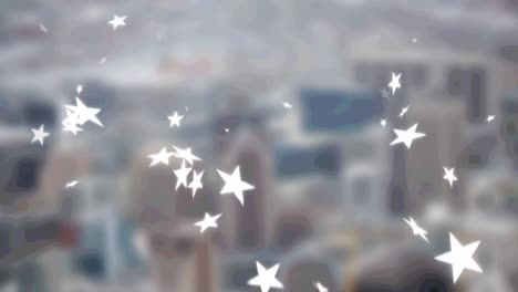 Animation-of-falling-white-stars-over-cityscape