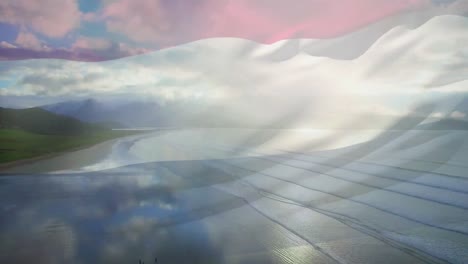 Animation-Der-Flagge-Der-Niederlande,-Die-über-Der-Strandlandschaft-Und-Dem-Wolkenverhangenen-Blauen-Himmel-Weht