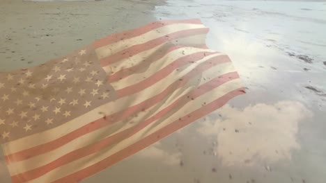 Animation-of-flag-of-united-states-of-america-blowing-over-sunny-beach-and-sea