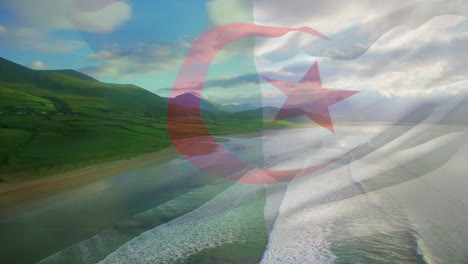 Animation-of-flag-of-algeria-waving-over-beach-landscape,-sea-and-cloudy-blue-sky