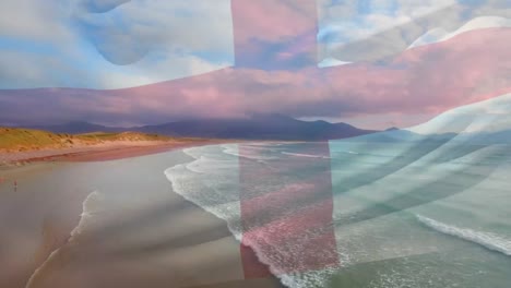 Animation-Der-Flagge-Englands,-Die-über-Der-Strandlandschaft-Und-Dem-Wolkenverhangenen-Blauen-Himmel-Weht