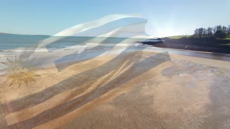Animation-of-flag-of-uruguay-blowing-over-sunny-beach-and-sea