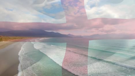 Animation-of-flag-of-england-waving-over-beach-landscape,-sea-and-cloudy-blue-sky