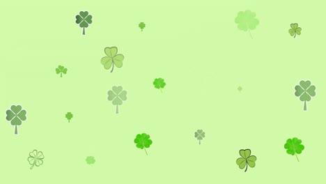 Animation-of-multiple-moving-clover-over-green-background