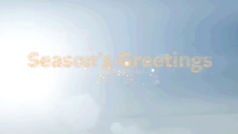 Seasons-greeting-text-over-fireworks-exploding-against-gradient-blue-background