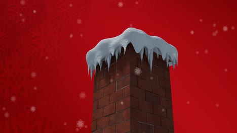 Snowflakes-falling-over-snow-covered-brick-wall-chimney-against-snowflakes-on-red-background