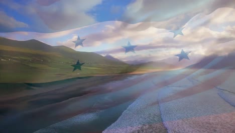Animation-of-flag-of-honduras-waving-over-beach-landscape,-cloudy-blue-sky-and-sea