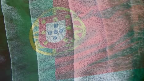 Digital-composition-of-waving-portugal-flag-against-aerial-view-of-the-sea-waves