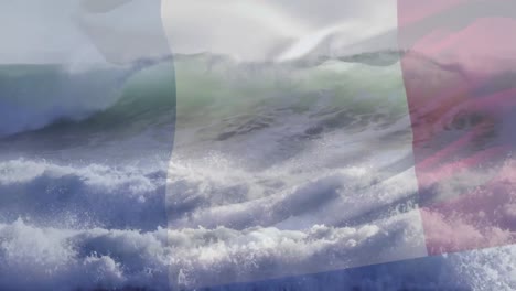 Animation-of-flag-of-france-blowing-over-crashing-waves-in-sea