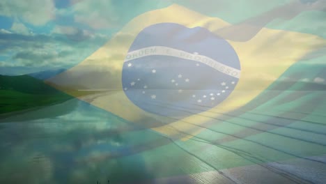 Digitale-Komposition-Der-Wehenden-Brasilianischen-Flagge-Vor-Der-Luftaufnahme-Von-Strand--Und-Meereswellen